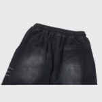Back view of the Hellstar airbrushed skull flare sweatpant in black featuring a vintage-washed premium fleece fabric.