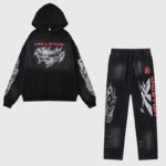 The Hellstar Airbrushed Skull Tracksuit in black featuring an edgy skull graphic, hoodie, and drawstring sweatpants.