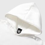 Close-up of the Hellstar All Star Hoodie showing the inner collar brand tag detail on the white fleece pullover.
