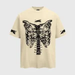 A beige Hellstar Barbed Wire Rib Cage graphic T-shirt featuring a black skeletal rib cage screen print on the front.