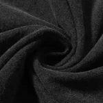Close-up view of the premium soft-touch black cotton fabric texture for the Hellstar Barbed Wire Rib Cage T-shirt.