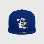 Hellstar blue baseball fitted hat featuring a white embroidered graphic of a star and a stylized flame face design.