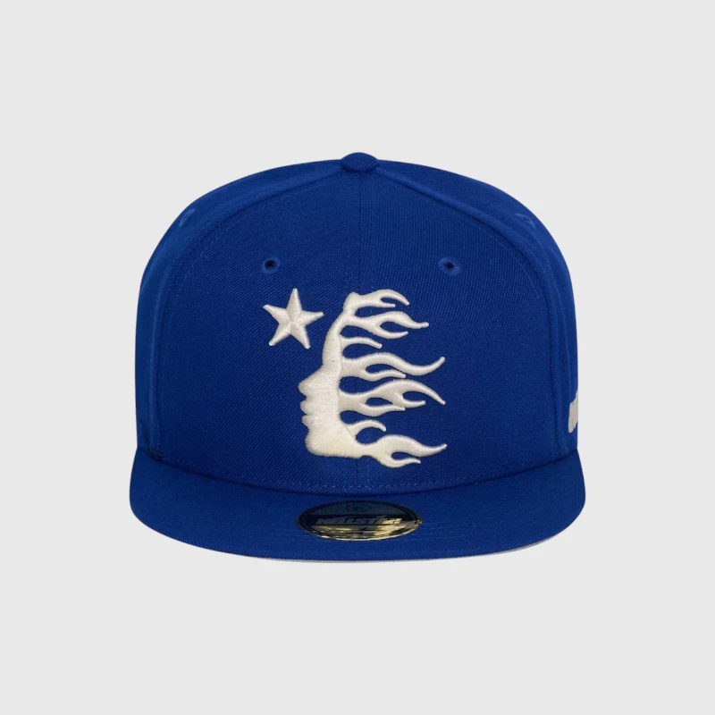 Hellstar Baseball Fitted Hat Blue Hellstar blue baseball fitted hat featuring a white embroidered graphic of a star and a stylized flame face design.