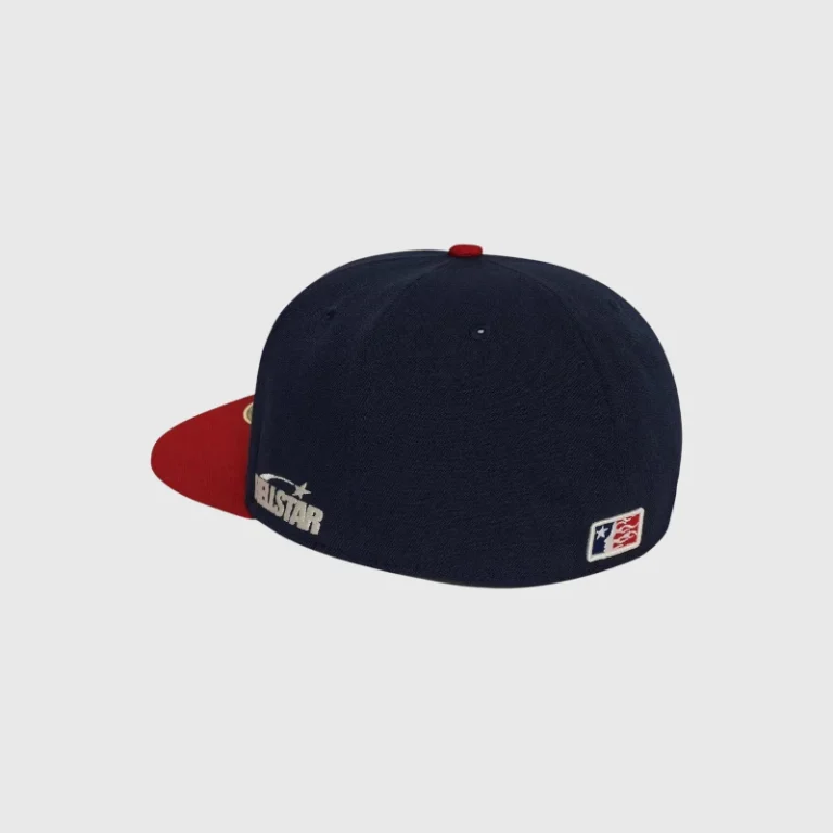 Premium navy blue Hellstar baseball fitted hat featuring embroidered branding and a structured flat brim design.