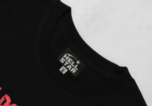 Hellstar Beat Us T-Shirt in black and red showing the inside collar with the official branded Hellstar garment neck tag.