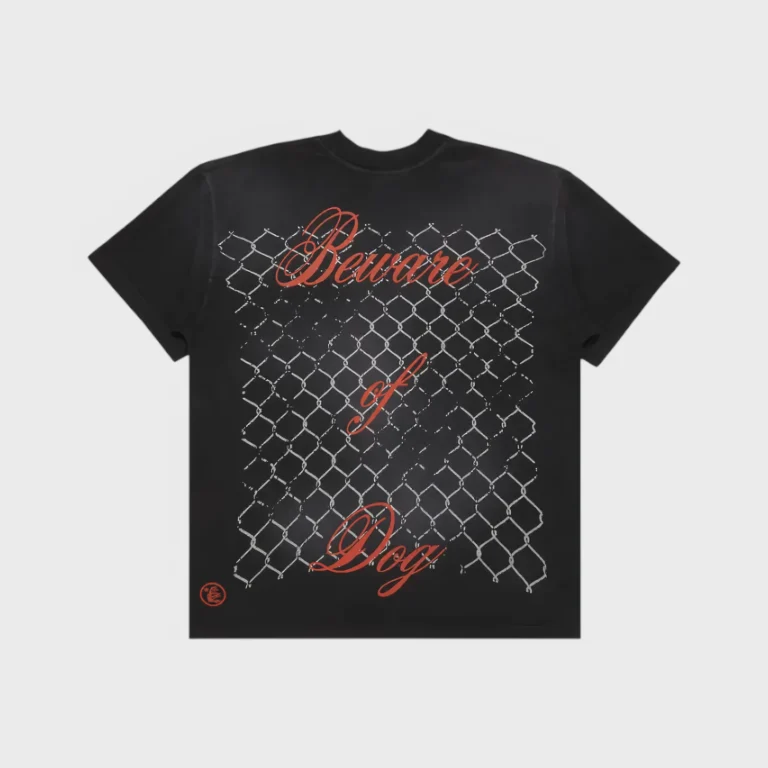 The back view of a black Hellstar Beware of Dog t-shirt featuring a chain-link fence graphic with red cursive text.