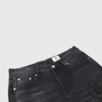 Premium Hellstar black denim flare jeans featuring signature branding and a vintage washed finish for urban streetwear.