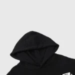 A close-up view of the hood on a premium black Hellstar graffiti print cotton-blend fleece designer streetwear hoodie.