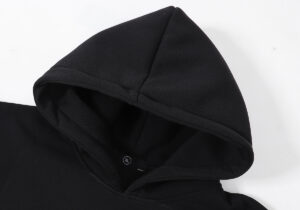 Close-up view of the hood detail on a premium Hellstar black hoodie made from high-quality fleece fabric materials.