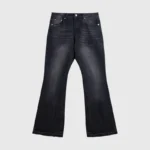 Front view of Hellstar Black Washed Denim Jeans with a vintage faded finish and a graphic logo print on the leg.