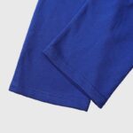 Close-up view of the premium blue fabric on the Hellstar No Guts No Glory tracksuit showcasing the high-quality material.