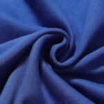 Close-up view of the premium heavyweight blue cotton fleece fabric used in Hellstar sportswear tracksuits.