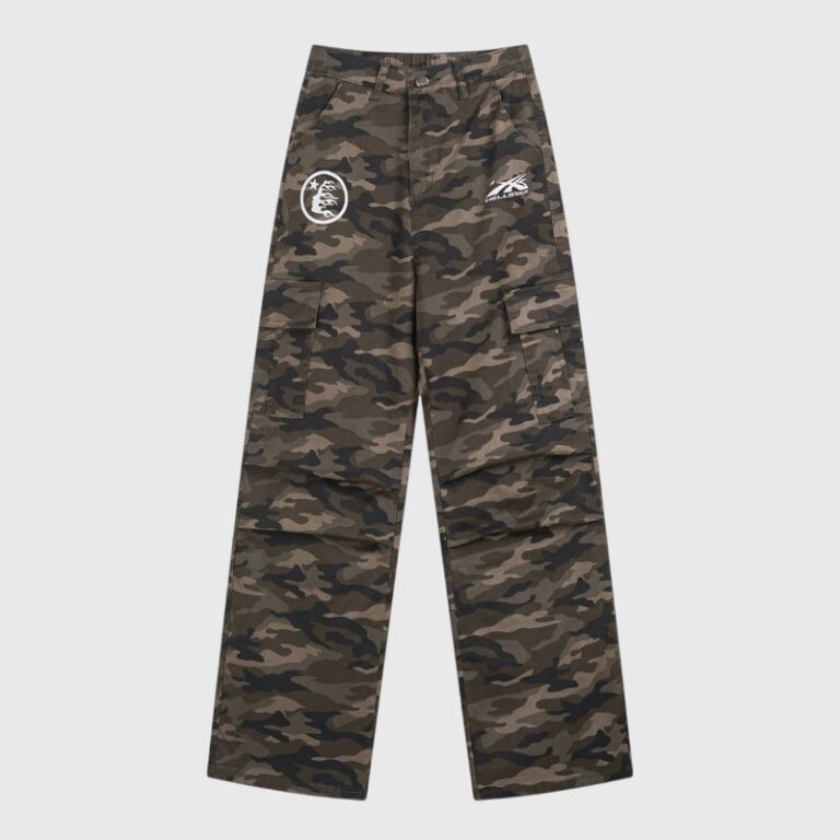 Hellstar camo cargo pants with white graphic logos on a classic camouflage print pattern for streetwear fashion enthusiasts.