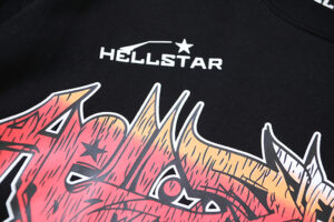 Hellstar Capsule 8 black T-shirt featuring a prominent white logo and an intricate, colorful geometric graphic print.