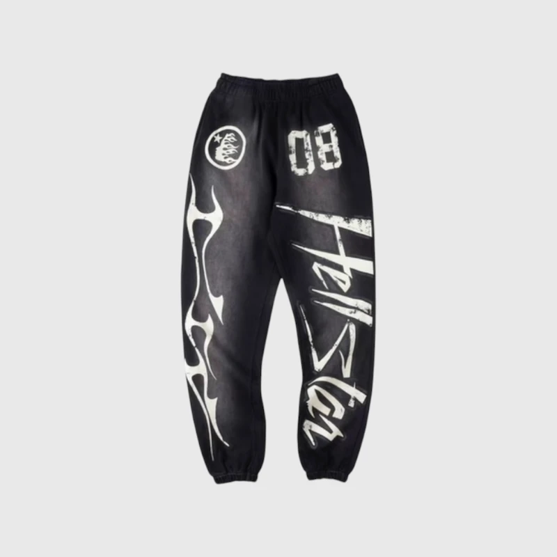 Hellstar Capsule 8 Paradise Black Sweatpants Front View Hellstar Capsule 8 Paradise Black Sweatpants with signature white vintage washed graphic print and drawstring closure.