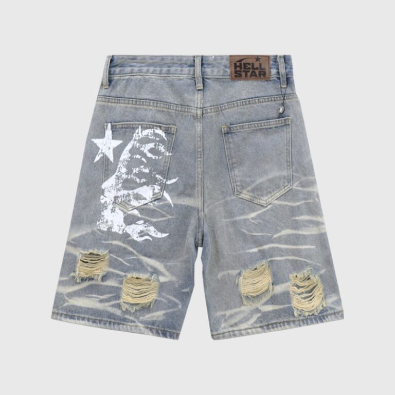 Hellstar Capsule 9 distressed blue denim shorts featuring a signature star graphic and vintage stone-washed look.