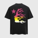 Hellstar Classic black t-shirt featuring a gradient pink and yellow flaming side profile graphic and star logo.
