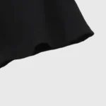 Close-up view of the sleeve detail on the premium black Hellstar Classic T-shirt made from high-quality soft cotton.
