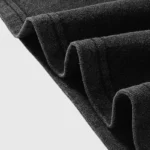 Detailed close-up view showing the soft black fabric texture of the Hellstar Crochet Jesus T-shirt garment.