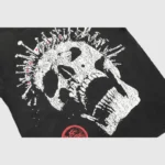 Close-up view of the white crowned skull graphic printed on the black Hellstar Skull Washed T-shirt streetwear tee.
