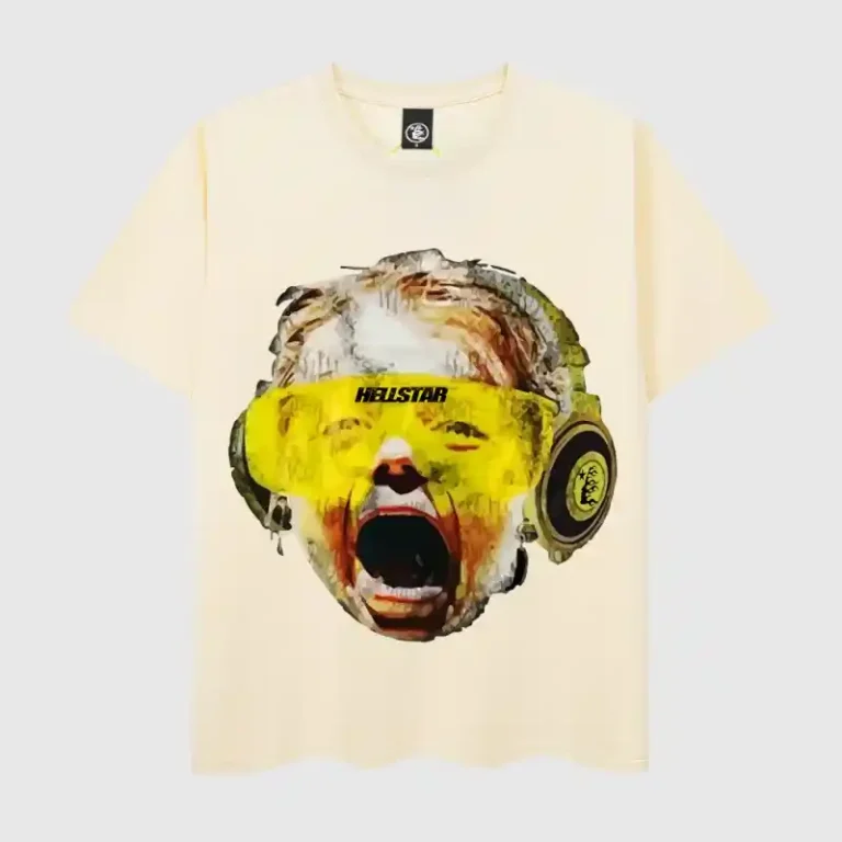 Hellstar beige graphic T-shirt featuring a crying baby wearing headphones and yellow goggles design on the front.
