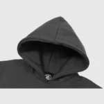 Close-up view of the hood on a premium black Hellstar Crying Baby Graphic Hoodie, showcasing the fabric detail.