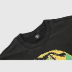 Close up view of the neckline and branding label on the black vintage washed Hellstar Dennis Rodman graphic t-shirt.