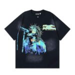Hellstar Devil Ozzy T-shirt in black featuring a vibrant screaming rocker graphic with a crown of thorns and microphone
