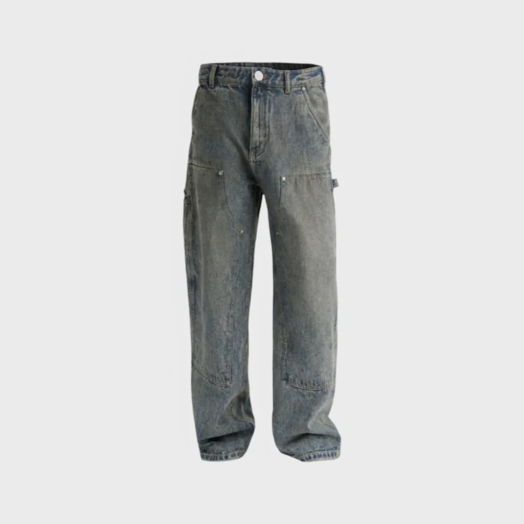 Hellstar blue denim carpenter jeans featuring a vintage dirty wash finish with a relaxed fit and workwear styling.