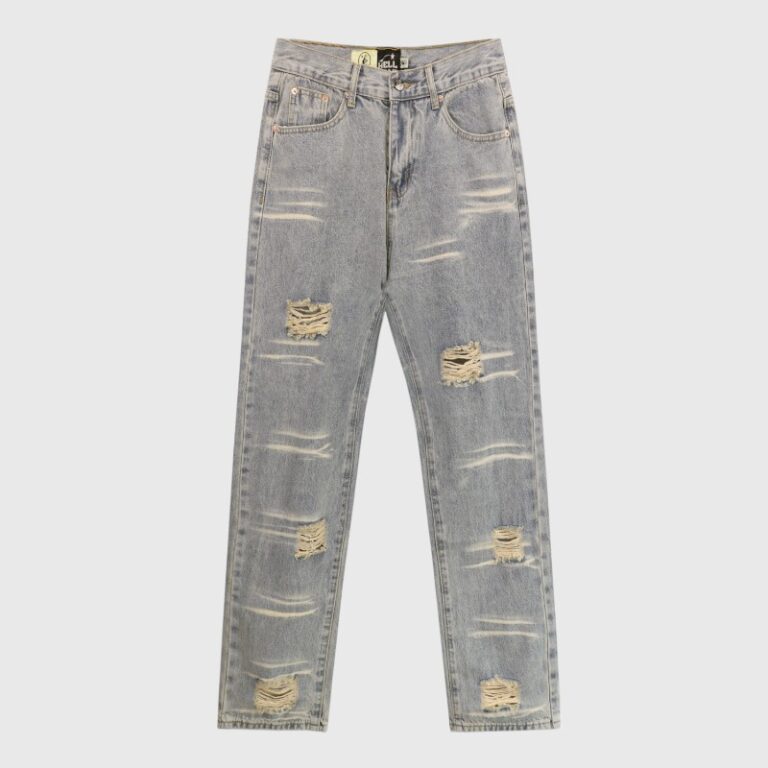 Front view of grey Hellstar distressed denim jeans featuring a vintage washed look and ripped details for streetwear.