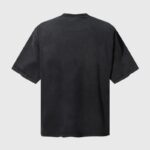 Back view of the vintage washed black Hellstar Earth printed T-shirt featuring a relaxed fit crew neck design.