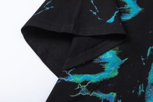 Close-up of the black Hellstar Electric Kid T-shirt showing the sleeve detail and vibrant blue neon graphic art.