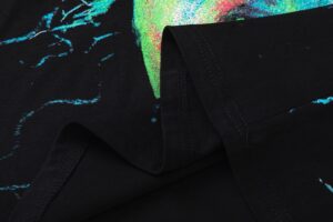 A close-up detail of the neon-infused graphic print on the Hellstar Electric Kid black cotton T-shirt design.