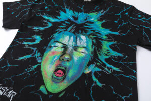 Black Hellstar Electric Kid t-shirt featuring a vibrant neon green and blue graphic print of a boy with static hair