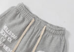 Hellstar Enlightenment sweatpants in grey showing high-quality vintage washed fabric and screen-printed graphic detail.