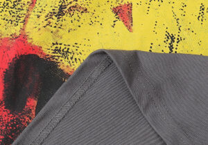 Detailed close-up view of the premium cotton fabric texture and graphic screen print on the Hellstar Evil Smile T-Shirt.