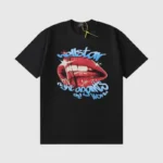 Hellstar Fight Against The World black graphic T-shirt with a vintage washed effect and unique lip design.