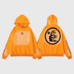 Front and back view of the vibrant Hellstar Fire Orange Dye Hoodie featuring a black graphic screen print design.