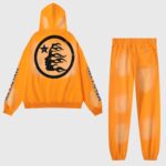 Hellstar Fire Orange dye unisex tracksuit set with back flame-profile logo, hoodie and cuffed sweatpants for streetwear