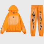 Hellstar Fire Orange Dye unisex tracksuit hoodie and joggers with faded flame graphics, drawstring waist, cuffed ankles
