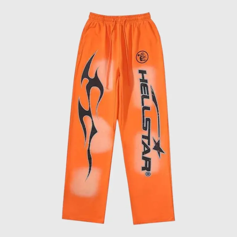 Bright orange Hellstar Fire elastic sweatpants with black flame graphic, Hellstar logo, drawstring waist and ribbed cuffs