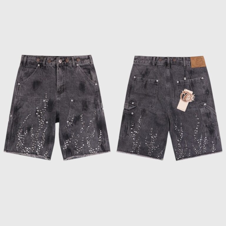 Front and back view of Hellstar Flame Studded Denim Shorts in distressed black cotton featuring silver stud flame designs.