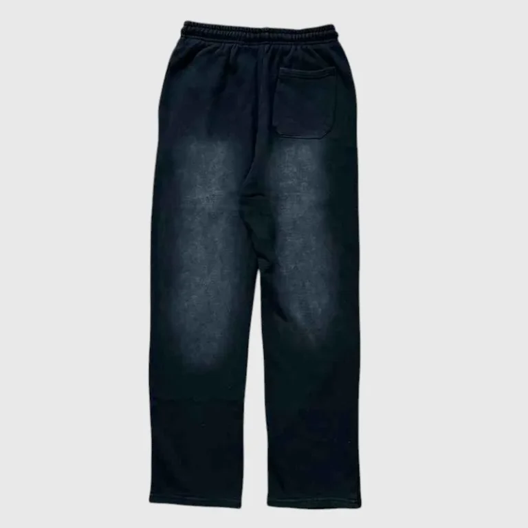 Back view of the black Hellstar Flame sweatpants showing the elastic waistband and casual relaxed fit design.