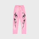 Hellstar Flame sweatpants in pink featuring iconic black flame graphics and an adjustable drawstring waistband.
