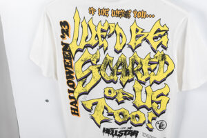 Back view of the white Hellstar Frankenstein Halloween 23 graphic t-shirt featuring distressed yellow typography.