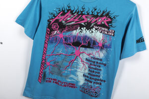 Front view of the blue Hellstar Future short sleeve tee featuring a bold graphic print with world tour locations.