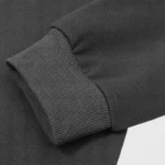 Detailed view of the ribbed cuff and premium vintage washed cotton material of the Hellstar Future Flame Hoodie