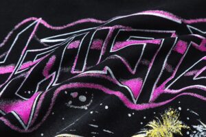 Close-up view of the black Hellstar Future T-shirt fabric showcasing the vibrant pink and white futuristic graphic.