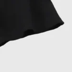 Close-up view showing the high-quality sleeve detail of the black Hellstar Goggles T-Shirt made of soft cotton.