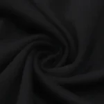 Close-up view of the premium black cotton fabric used in the Hellstar Gradient Flame T-shirt collection.